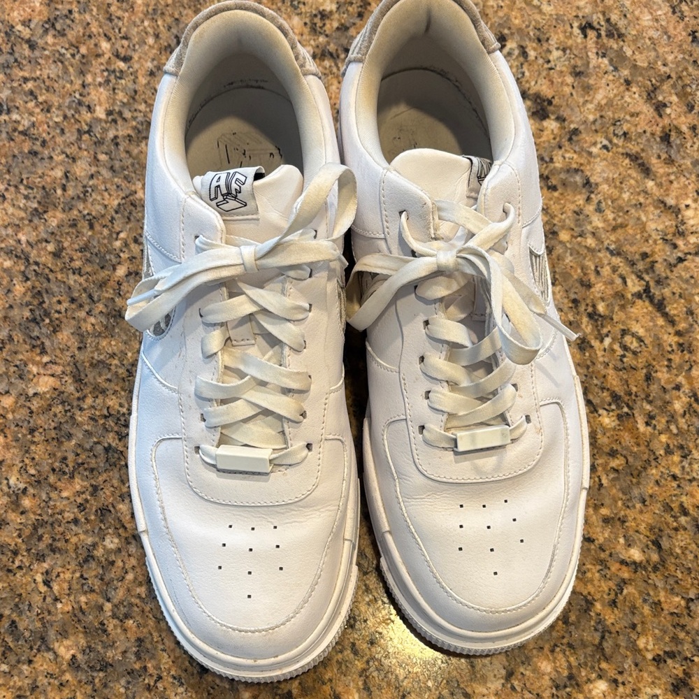 Nike Air Force White Athletic Sneakers with gray patterned swoosh